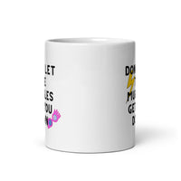 Don’t Let The M’s Get You Down White glossy mug