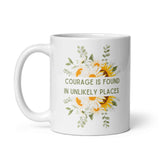 Courage Is Found In Unlikely Places White glossy mug