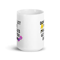 Don’t Let The M’s Get You Down White glossy mug