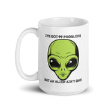 I’ve Got 99 Problems But An Alien Ain’t One White glossy mug