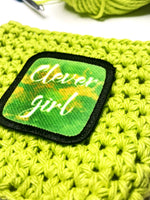 Clever Girl Dino Park reusable crochet coffee cozy